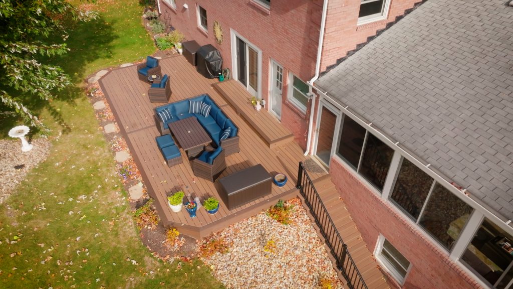 TimberTech Legacy ground-level deck with Pecan decking and Mocha border in McMurray, PA